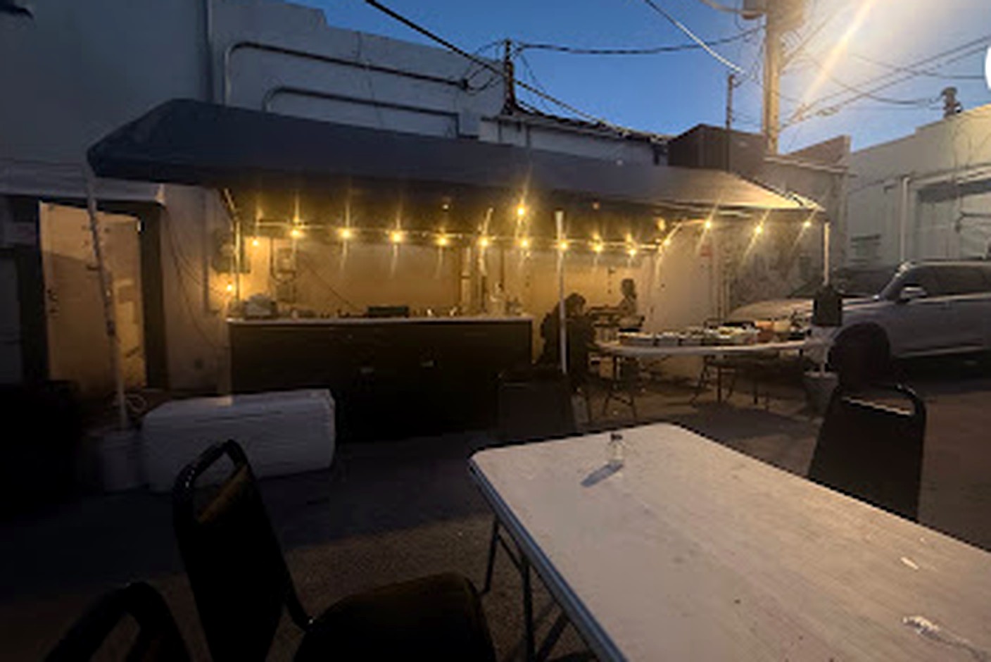Outdoor evening setup at Alley Taco Stand in Vero Beach
