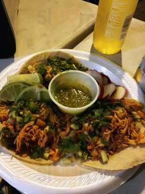 Tacos with lime and salsa from Alley Tacos