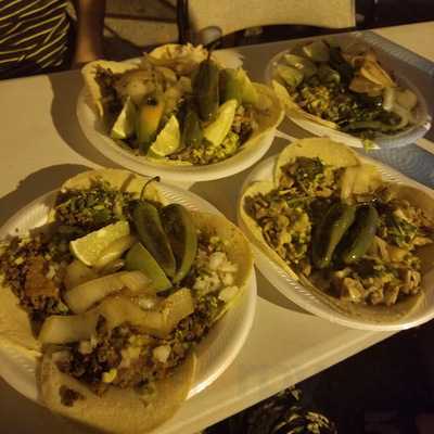 Multiple plates of tacos from Alley Tacos